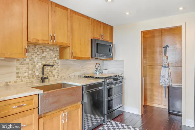 a view of swimming pool with outdoor seating