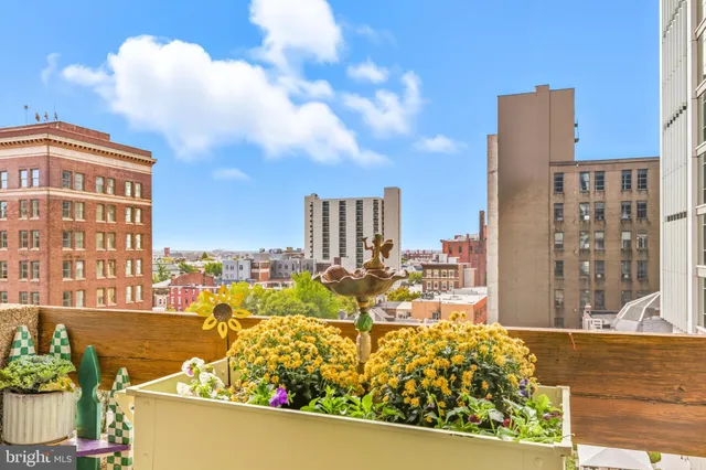 a bathroom with a granite countertop sink a shower and a mirror