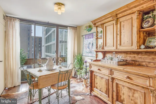 a view of a kitchen area with furniture and windows