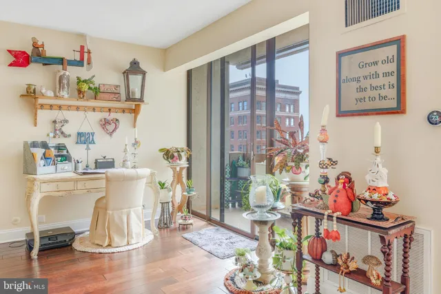 a kitchen with a sink a counter and cabinets