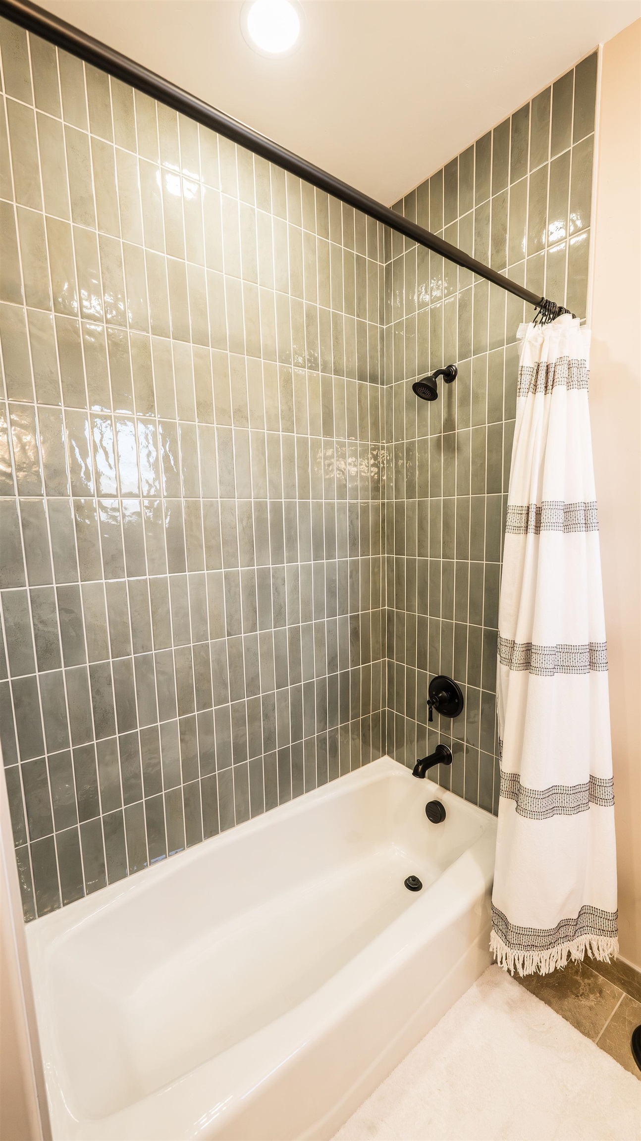 2639 Emerald Ridge Lane Grand Junction, CO 81506 - Photo 27 of 42 a bathroom with a bathtub and shower