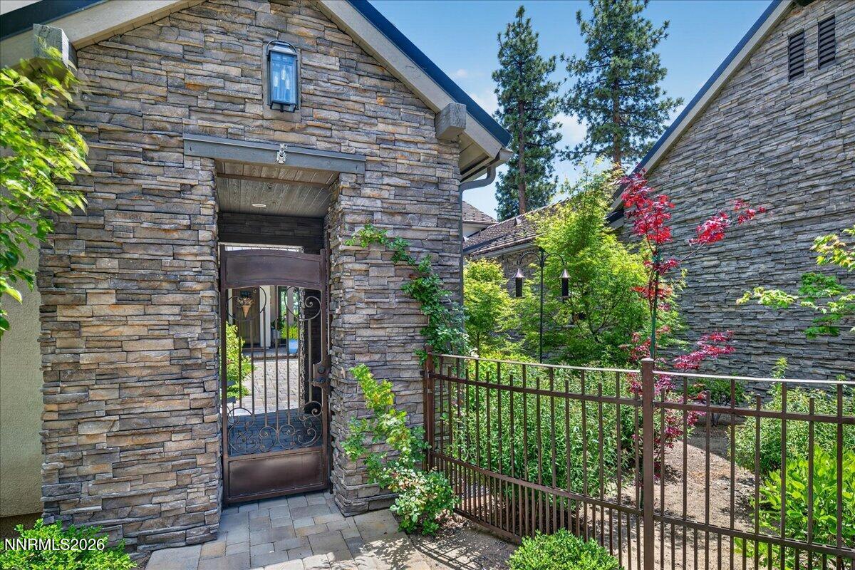 5096 Bordeaux Court Reno, NV 89511 - Photo 4 of 70 a front view of a house with a garden