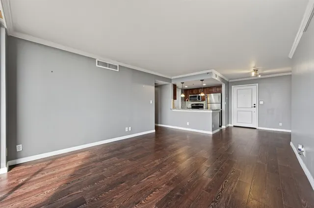 a kitchen with a stove a sink and a refrigerator