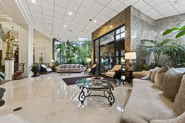 a kitchen with stainless steel appliances granite countertop a stove microwave and refrigerator