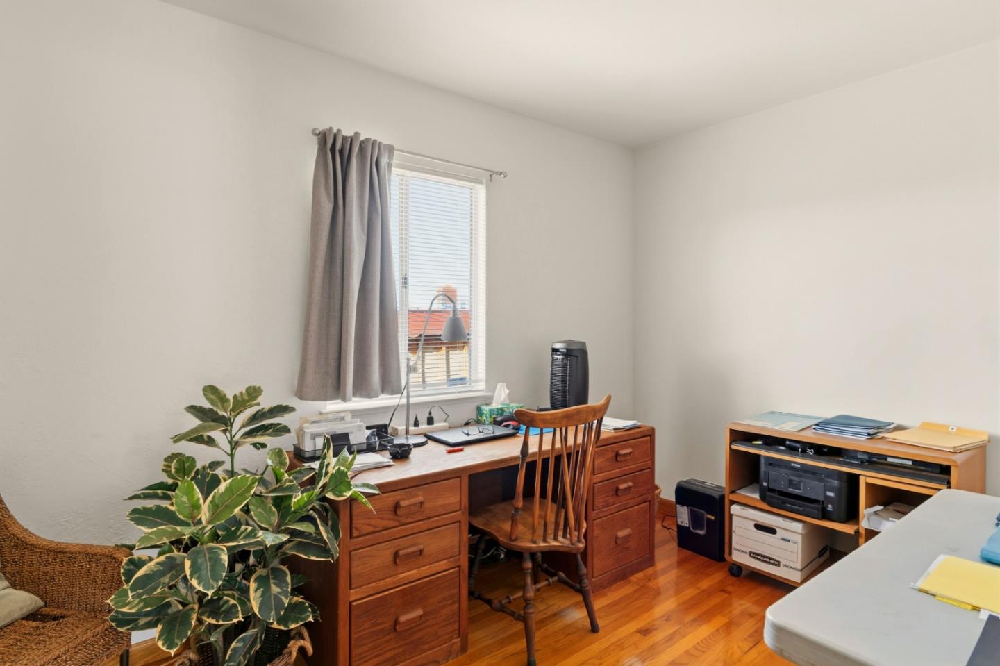 1313 Harding Street Seaside, CA 93955 - Photo 17 of 26 a view of a workspace with furniture and a potted plant