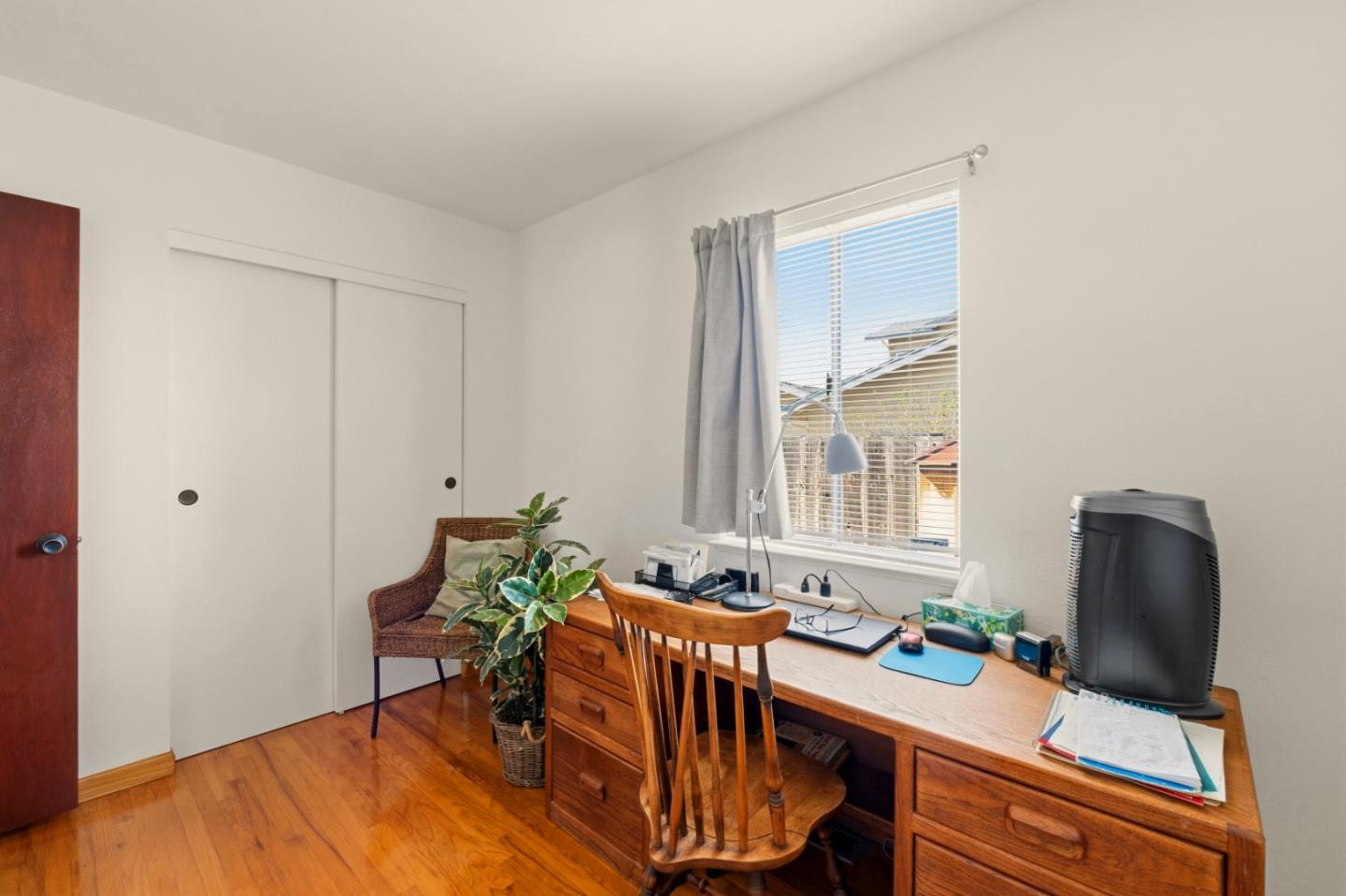 1313 Harding Street Seaside, CA 93955 - Photo 18 of 26 a workspace with furniture and wooden floor