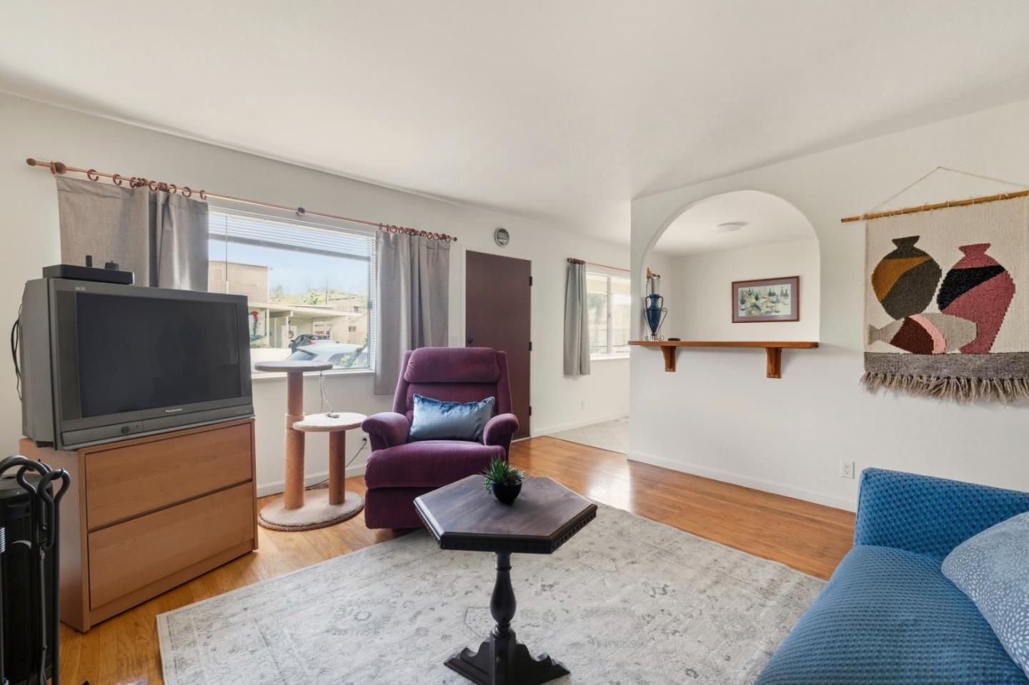 1313 Harding Street Seaside, CA 93955 - Photo 4 of 26 a living room with furniture and a flat screen tv