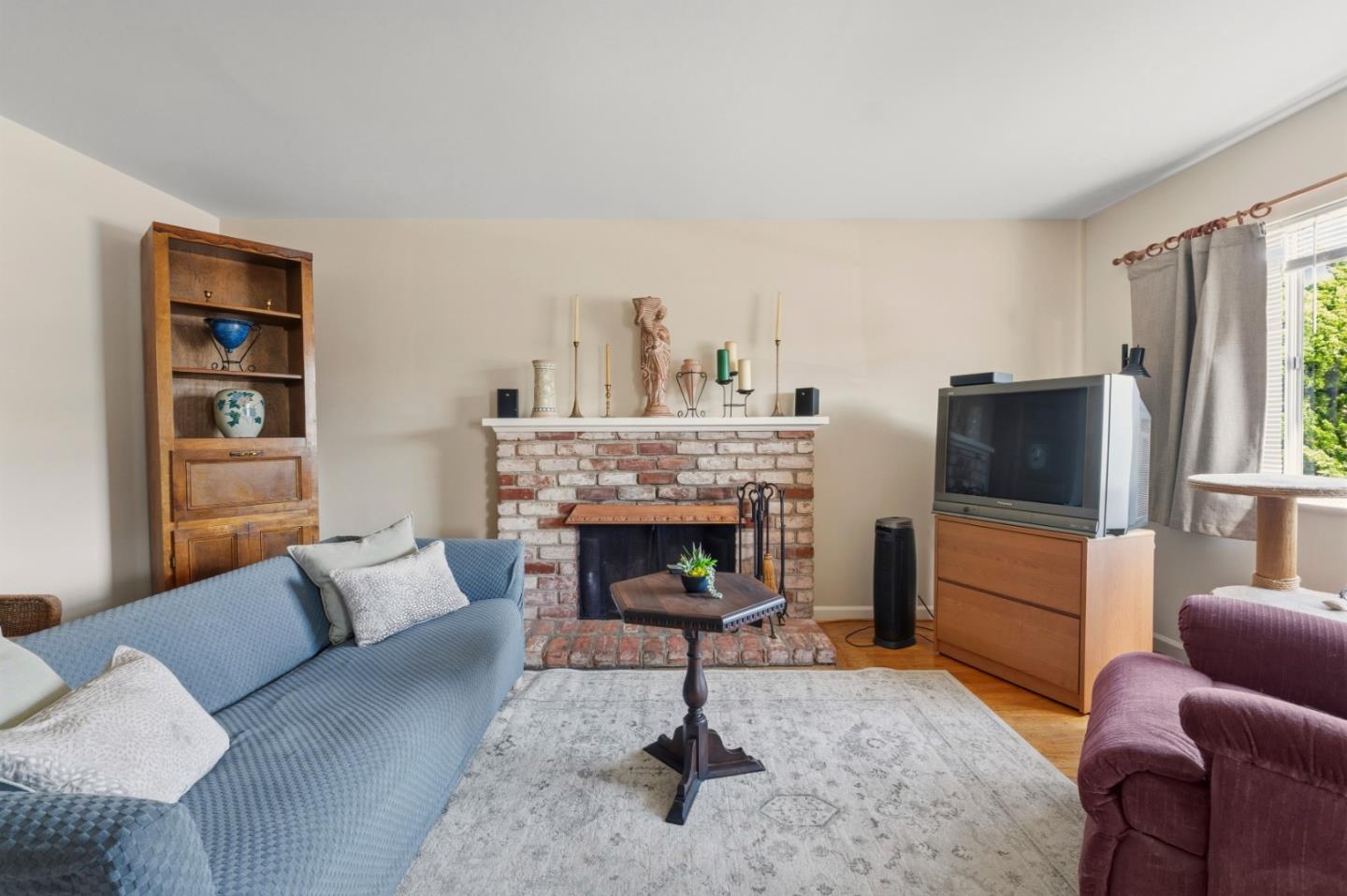 1313 Harding Street Seaside, CA 93955 - Photo 5 of 26 a living room with furniture and a fireplace