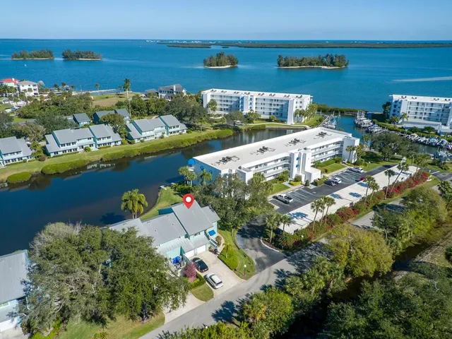 an aerial view of a house with a garden