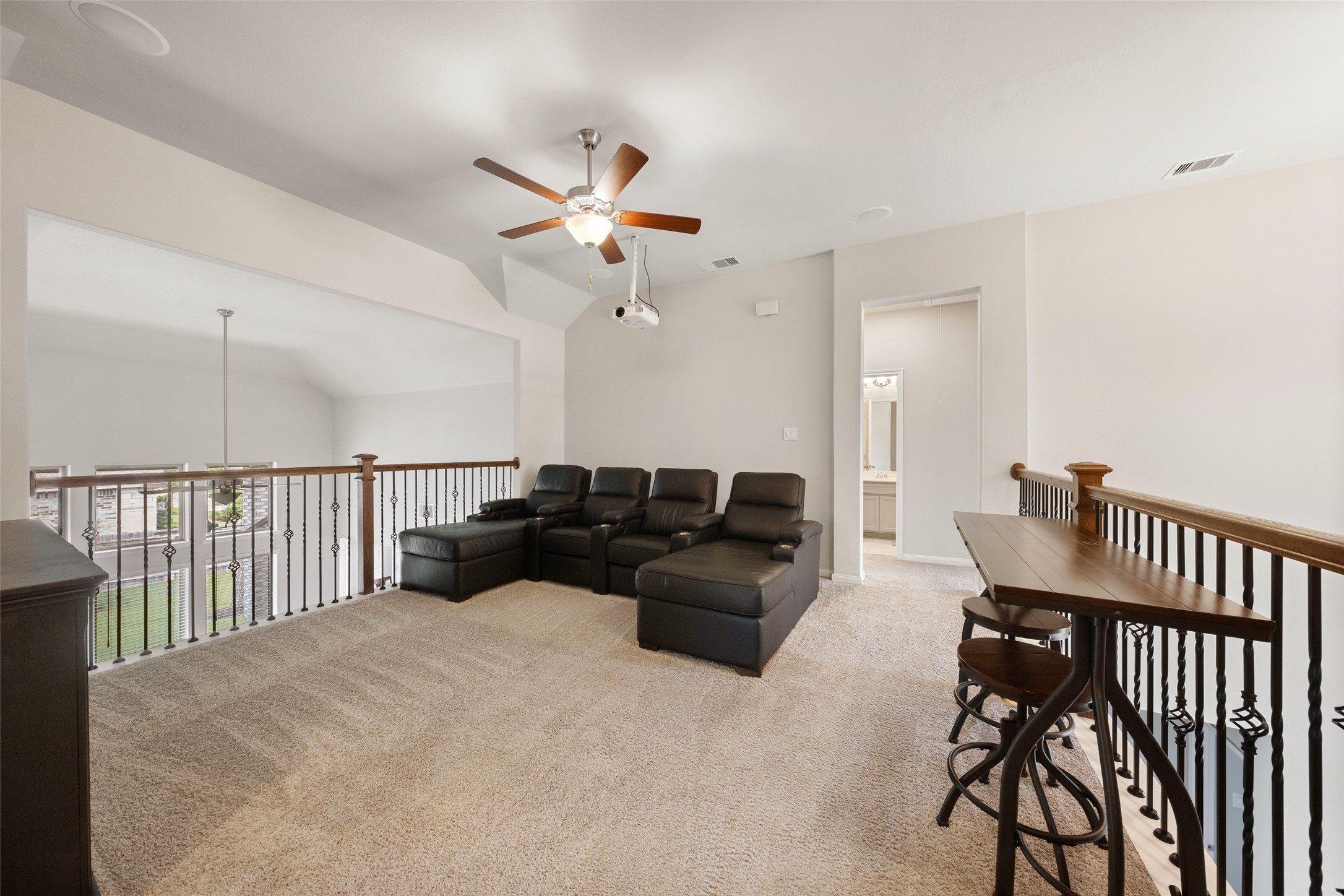 17323 Grand Canyon Road Conroe, TX 77302 - Photo 7 of 33 Game room upstairs with added media features.