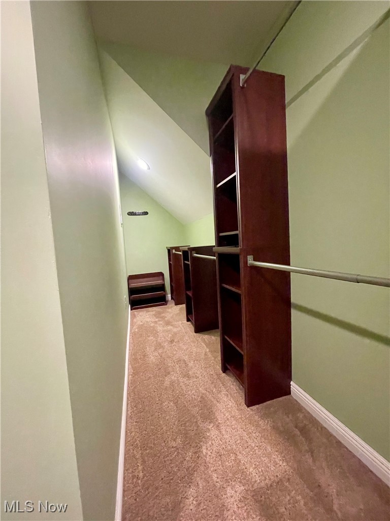 1544 Edgefield Road Lyndhurst, OH 44124 - Photo 31 of 36 Spacious closet featuring light carpet and lofted ceiling