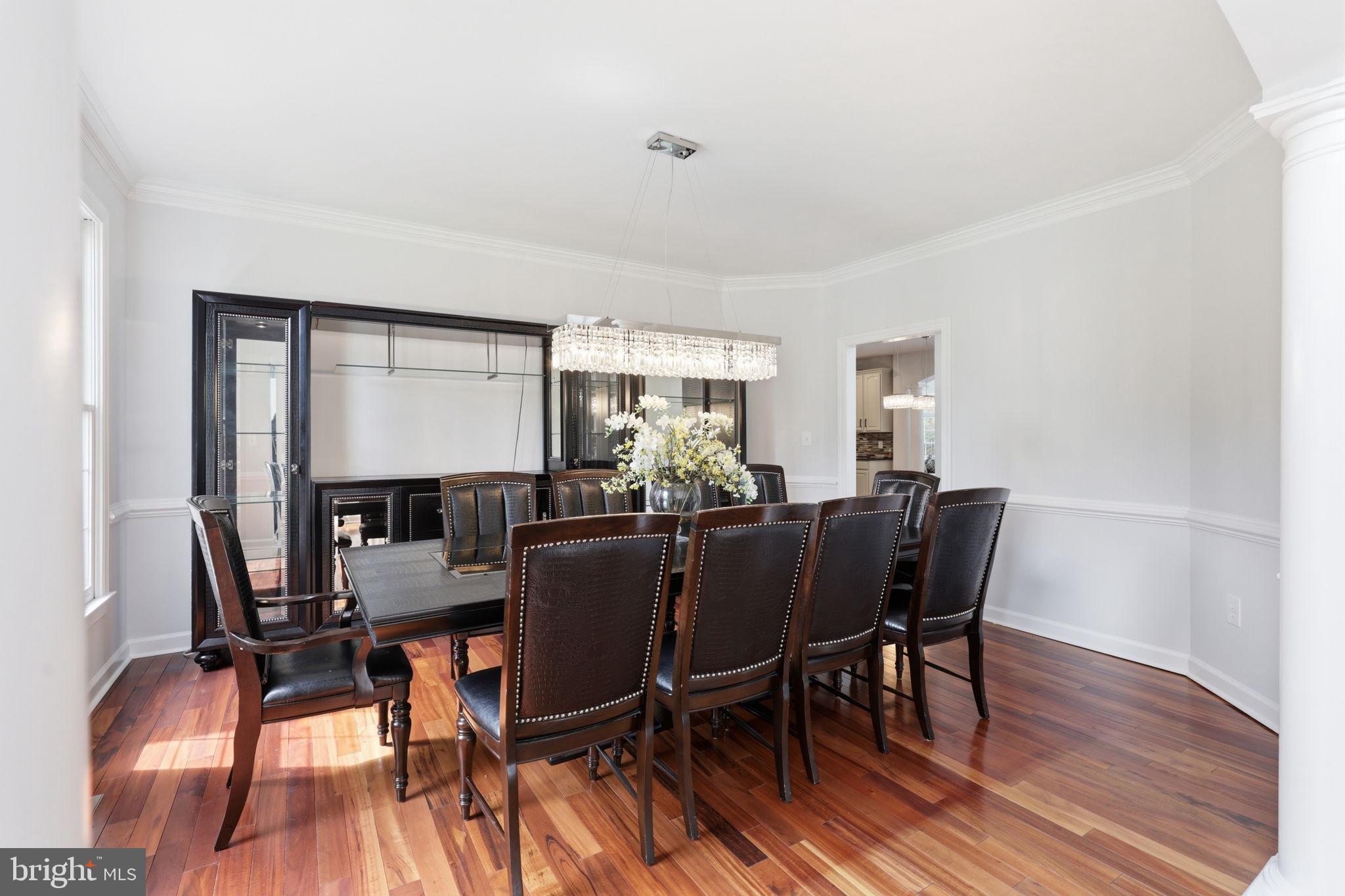 18426 Rim Rock Circle Leesburg, VA 20176 - Photo 8 of 60 Elegant dining space with warm tones.