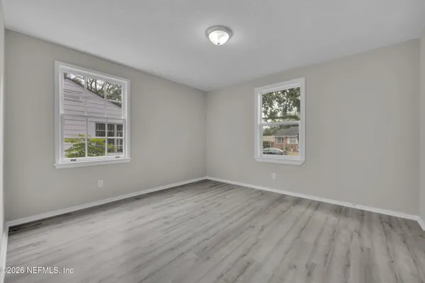 an empty room with windows