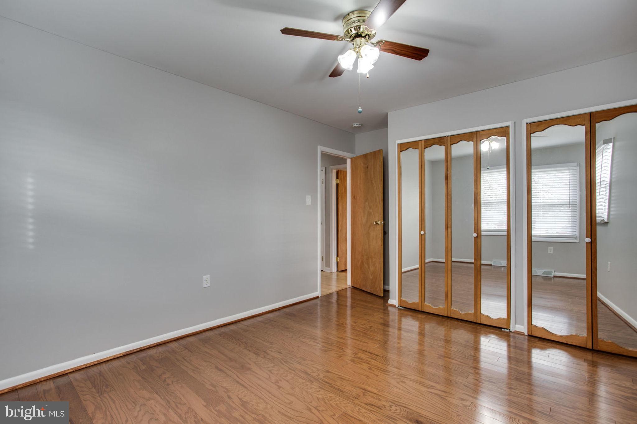 1625 Thomas Drive Point of Rocks, MD 21777 - Photo 24 of 47 wooden floor in an empty room with a window