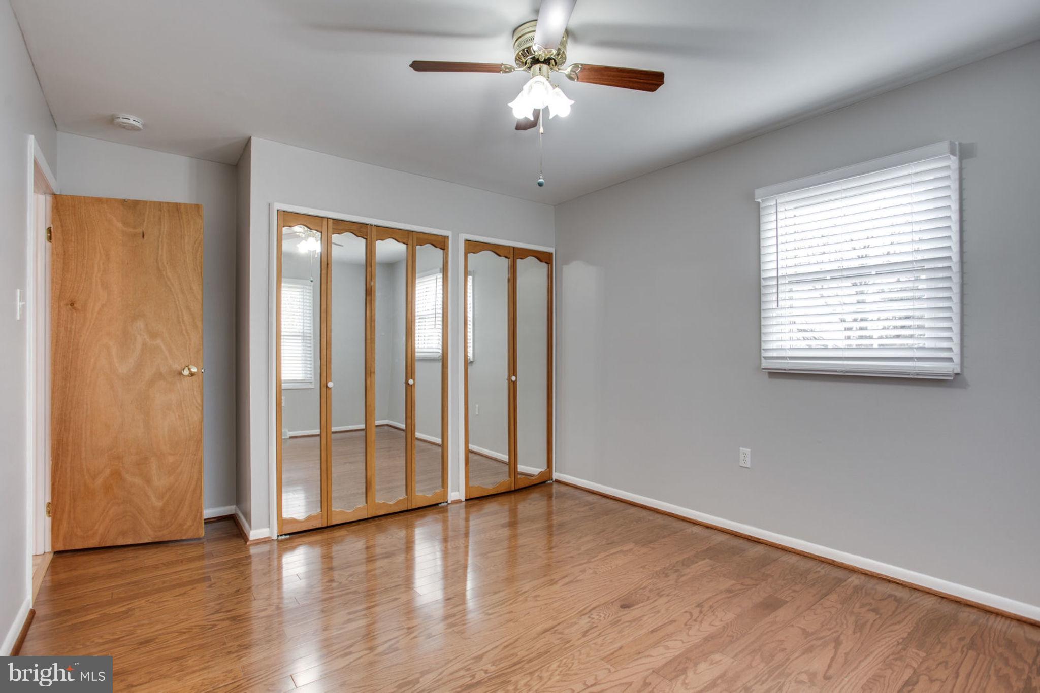 1625 Thomas Drive Point of Rocks, MD 21777 - Photo 25 of 47 wooden floor in an empty room with a window