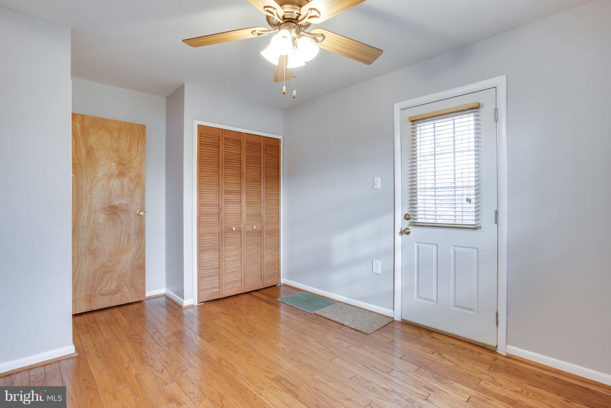 1625 Thomas Drive Point of Rocks, MD 21777 - Photo 28 of 47 a view of an empty room with wooden floor and a window