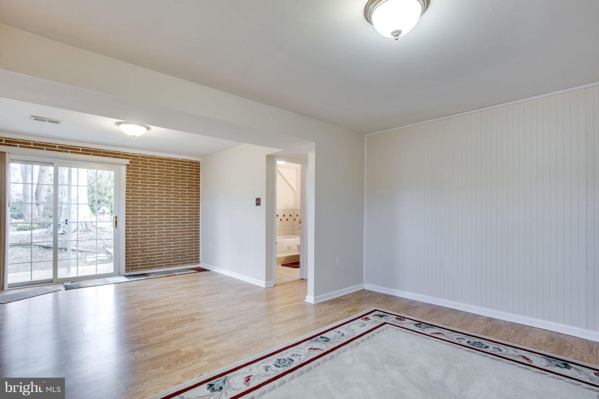 1625 Thomas Drive Point of Rocks, MD 21777 - Photo 32 of 47 wooden floor in an empty room with a window