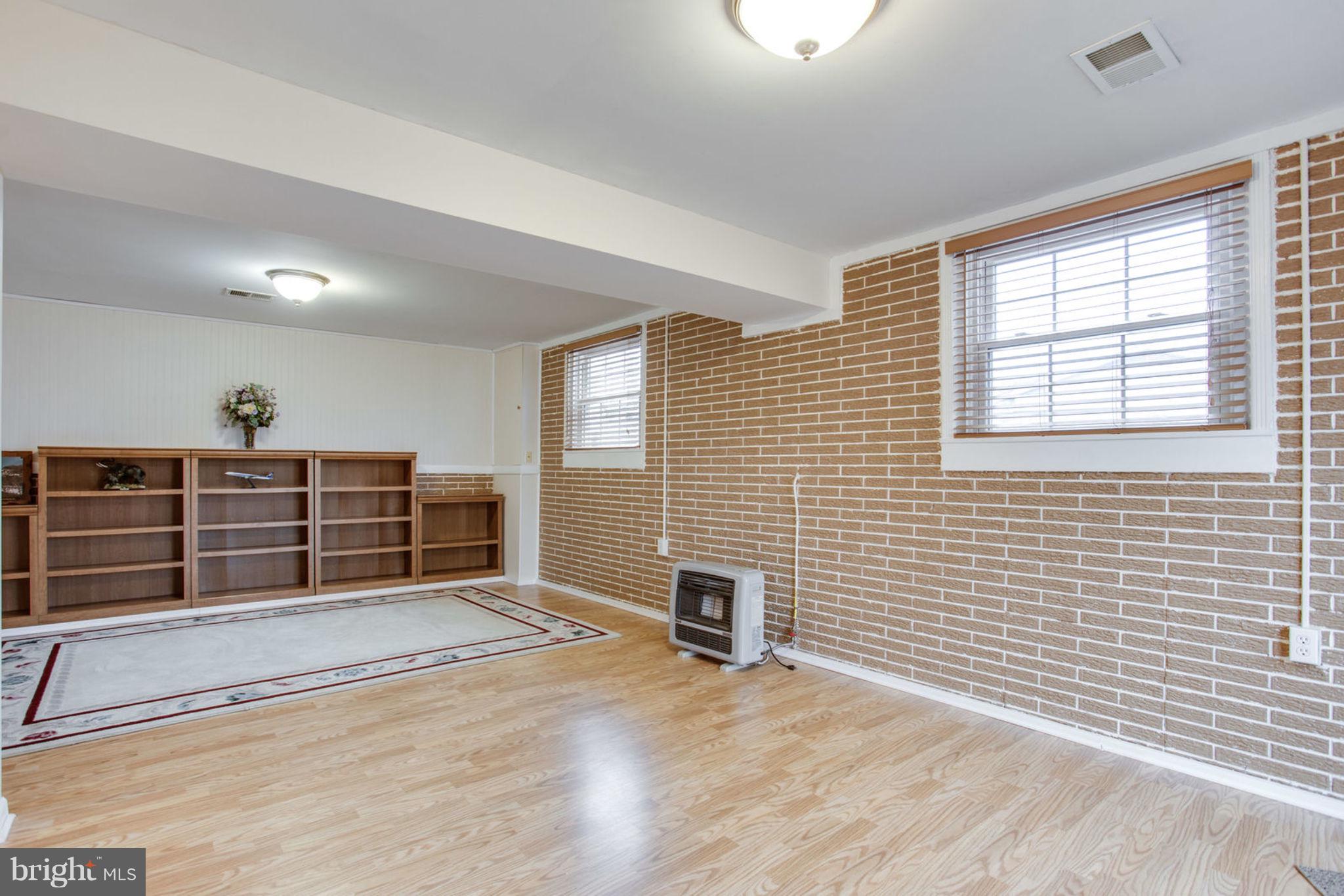 1625 Thomas Drive Point of Rocks, MD 21777 - Photo 36 of 47 a view of empty room with wooden floor and windows