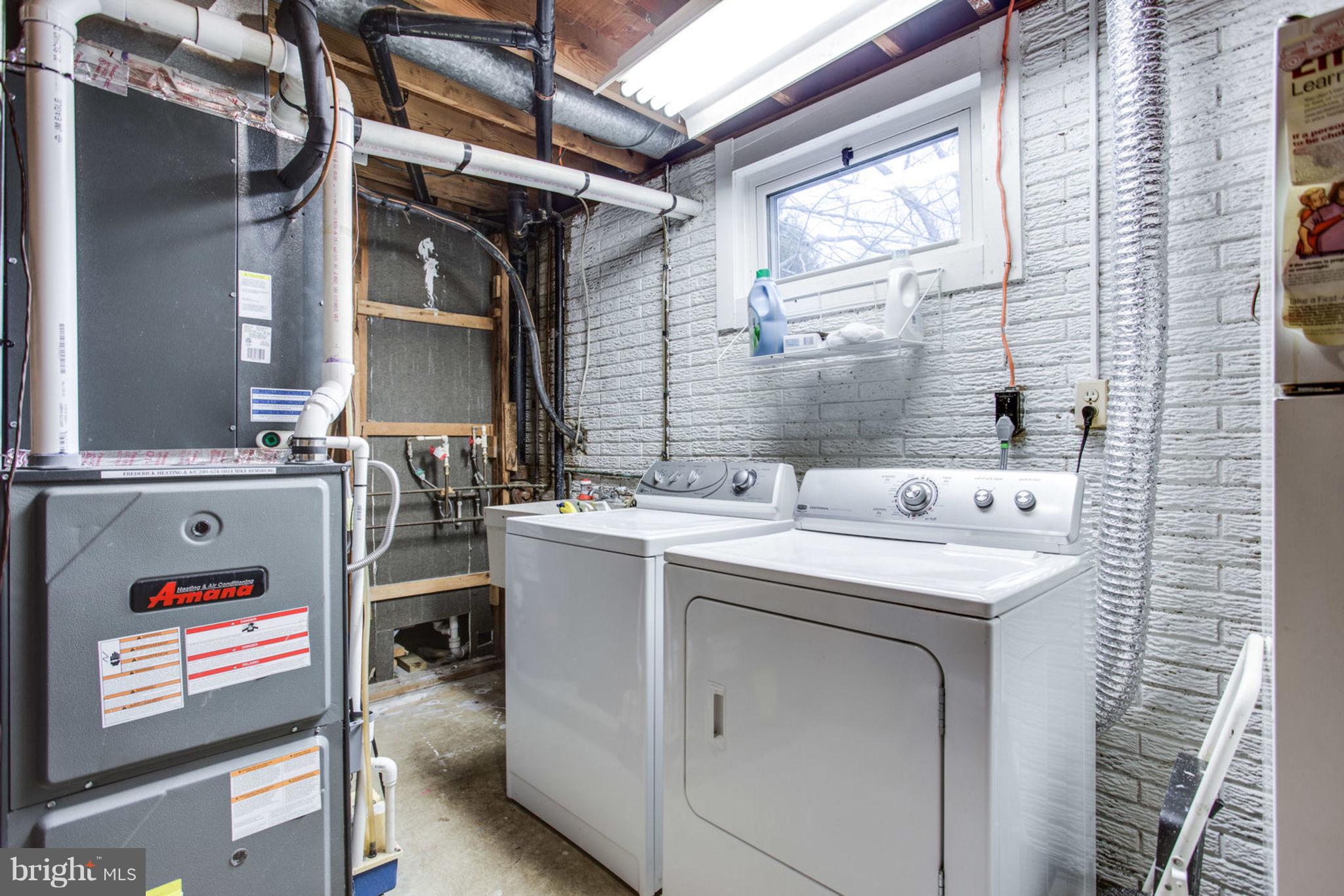 1625 Thomas Drive Point of Rocks, MD 21777 - Photo 42 of 47 a utility room with dryer and washer