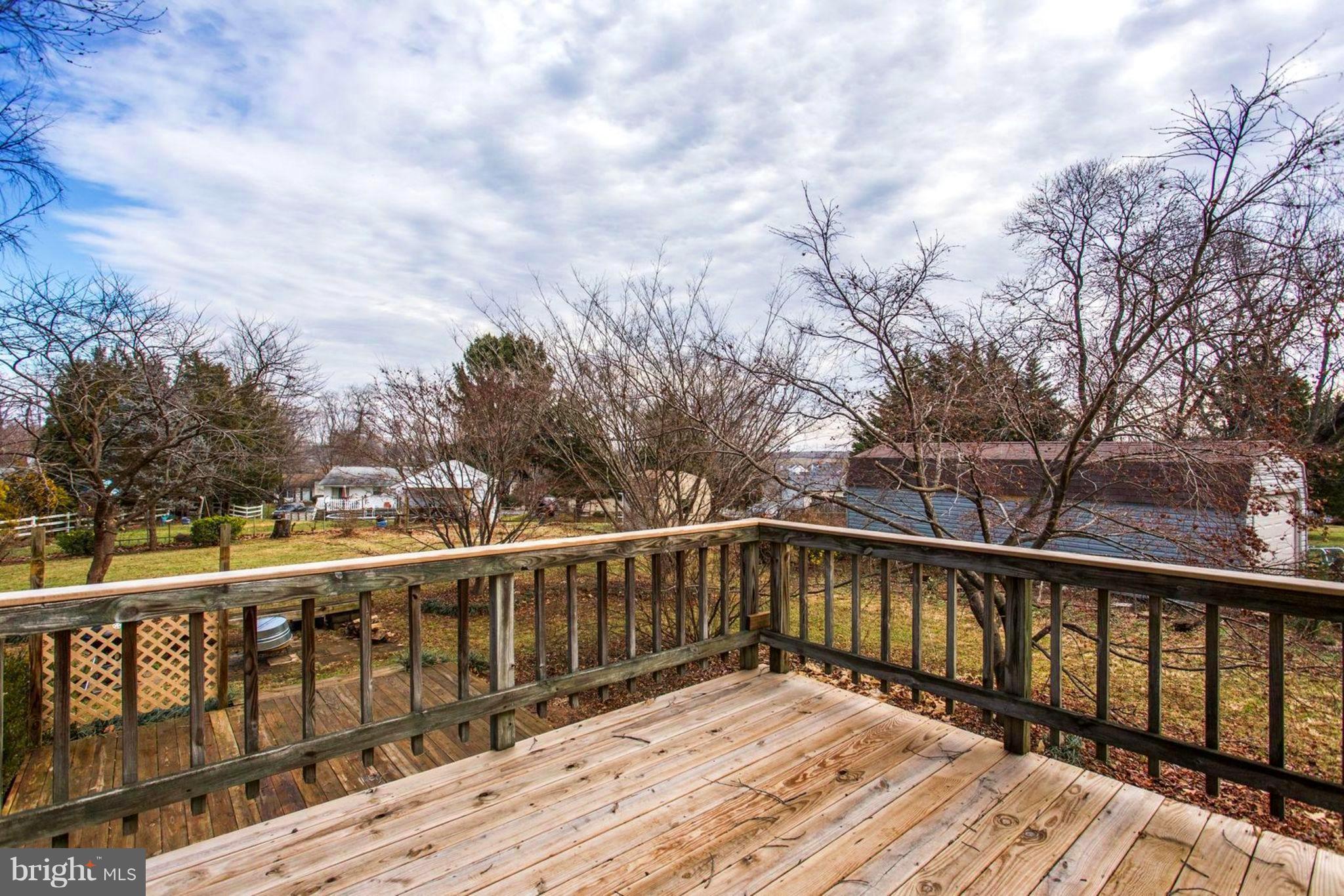 1625 Thomas Drive Point of Rocks, MD 21777 - Photo 46 of 47 a deck with trees in front of it