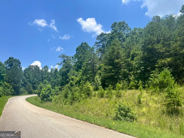 a sign that is on a brick wall with a signage