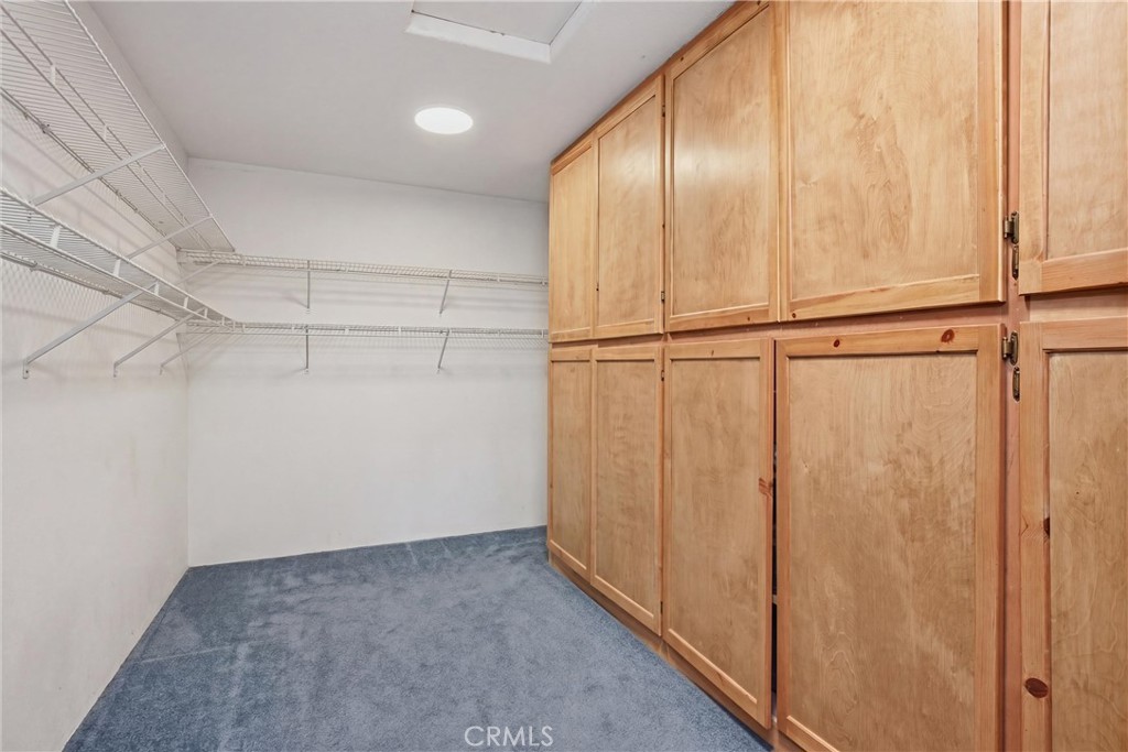 16965 Spruce Grove Road Hidden Valley Lake, CA 95467 - Photo 11 of 34 a view of a room with racks on the wall