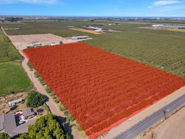 a view of a backyard with outdoor space