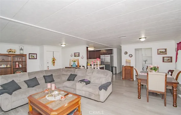 a living room with furniture and a table