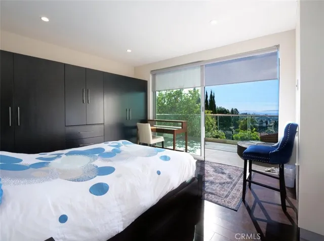 a bed room with a bed and a table