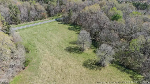 a view of a big room with windows