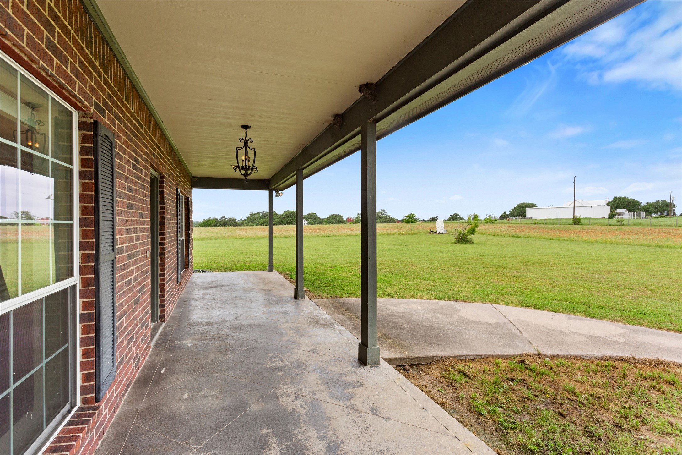 5750 Cedar Hill Road Brenham, TX 77833 - Photo 11 of 46 A view of this oversized front porch
