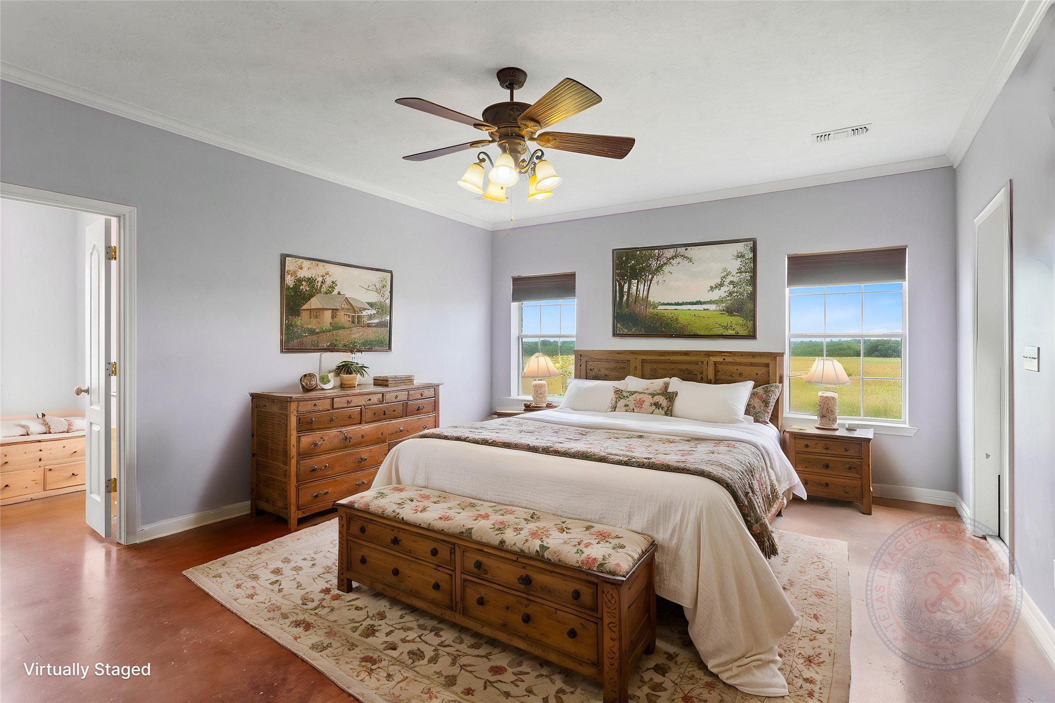 5750 Cedar Hill Road Brenham, TX 77833 - Photo 25 of 46 Another view showcasing the staged design of the incredibly spacious main bedroom. Its size easily accommodates even a large king-size bed in various configurations.