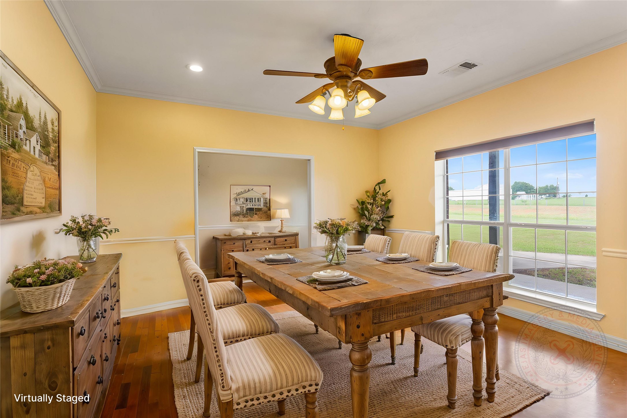 5750 Cedar Hill Road Brenham, TX 77833 - Photo 32 of 46 This staged photo presents the flex room as a private formal dining area, the perfect backdrop for showcasing your culinary creations while entertaining friends.