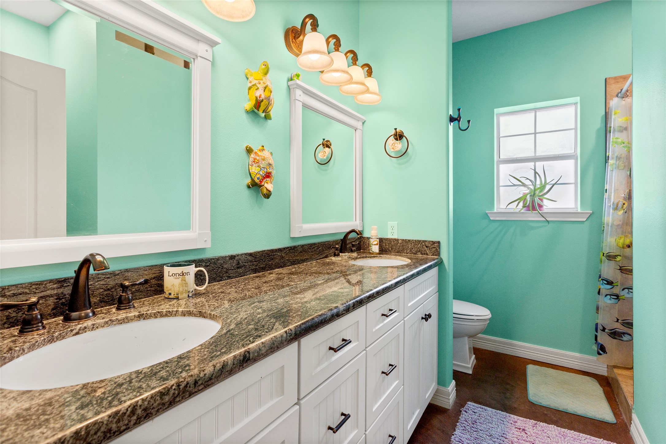 5750 Cedar Hill Road Brenham, TX 77833 - Photo 38 of 46 This second full bathroom offers a double vanity, a thoughtfully designed niche for storage or laundry, and a recently updated luxury walk-in shower.