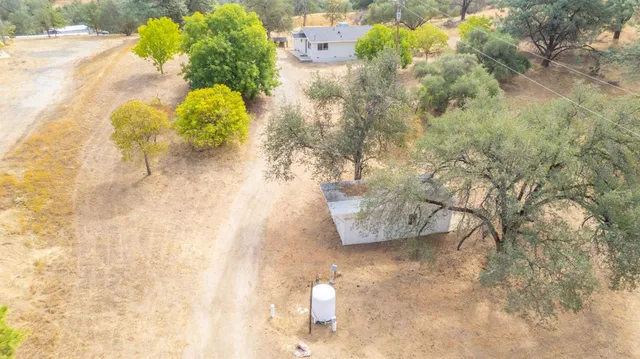 a bathroom with a sink mirror and vanity