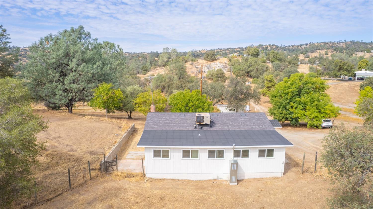 29531 Morgan Canyon Road Prather, CA 93651 - Photo 33 of 42 a aerial view of a house