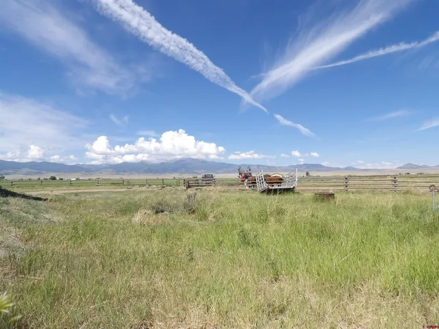 a view of a green field with lots of green space