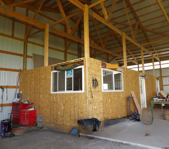 a view of a car park in front of a building