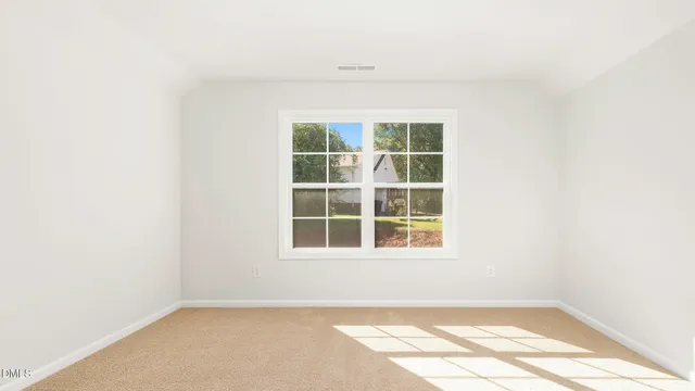 a bathroom with a sink toilet vanity and shower