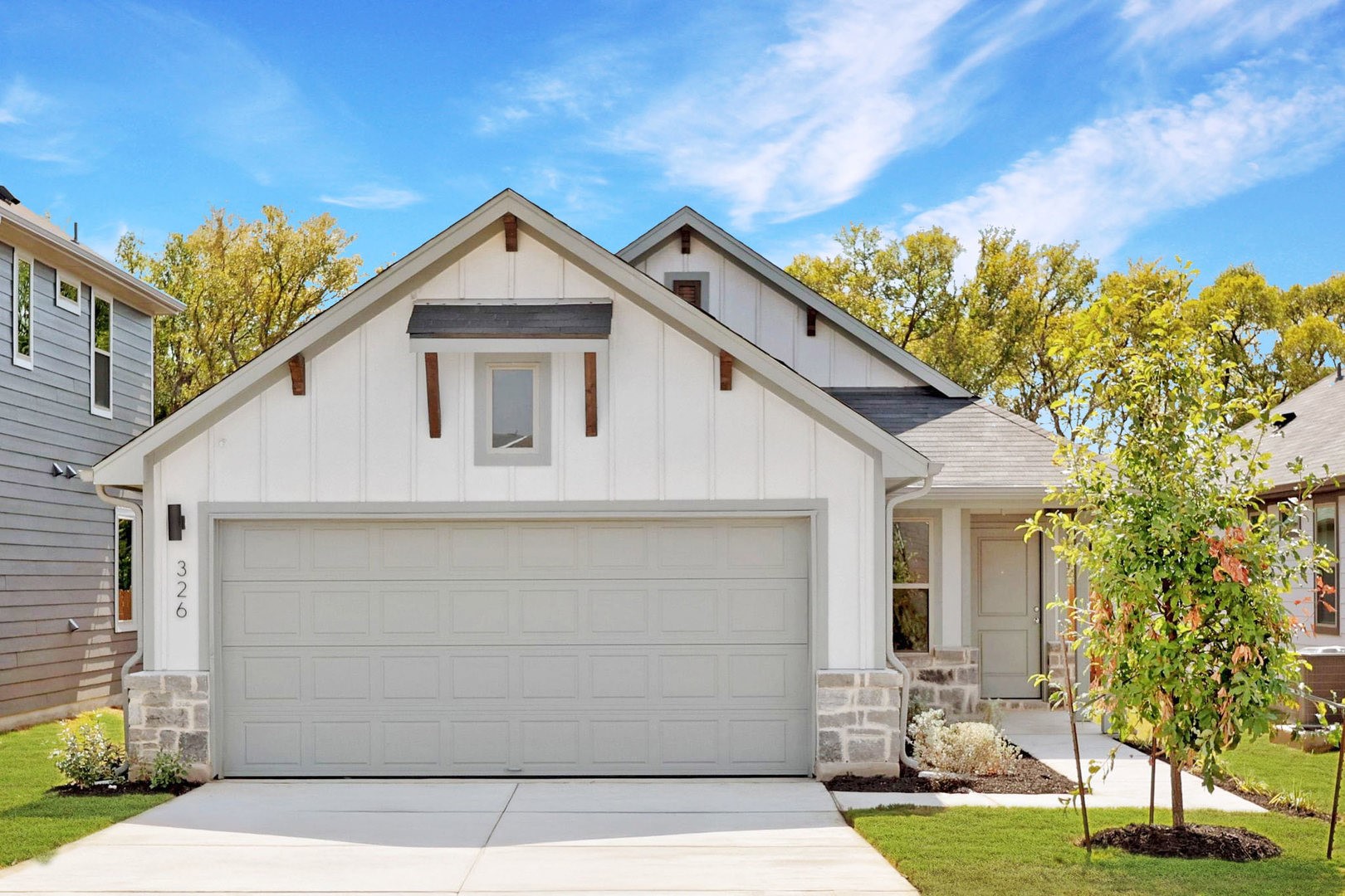 a view of house with yard