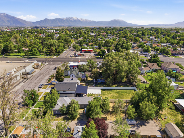 75 600 West Provo, UT 84601 - Photo 24 of 26 Aerial perspective showcasing a residential area with varied architecture and mature trees