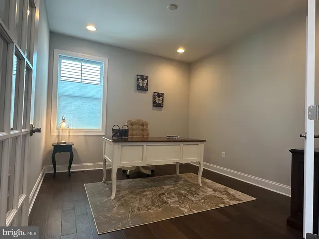 a view of a workspace with furniture