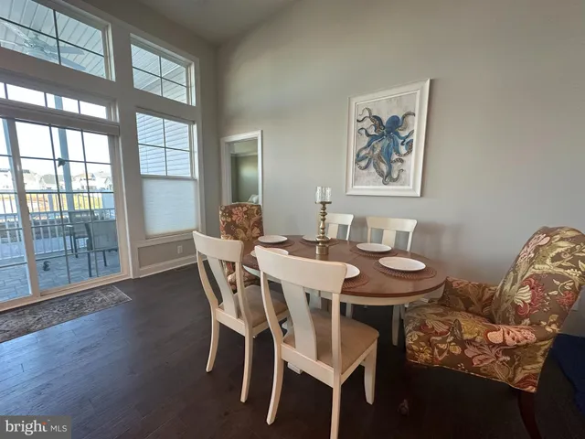 a spacious bedroom with a bed and window