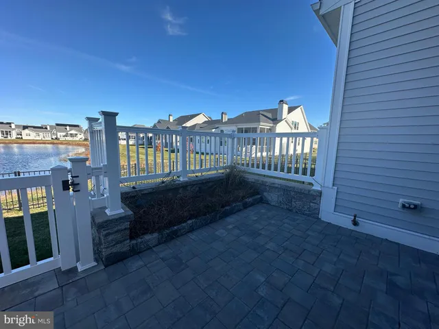 a view of a chair and table in the balcony