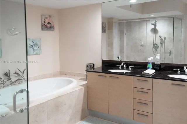 a bathroom with a sink and a bathtub