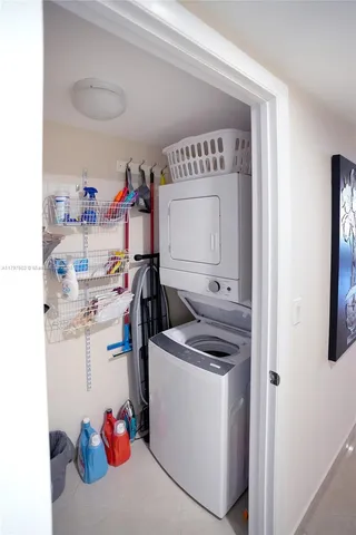 a storage room with washer and dryer