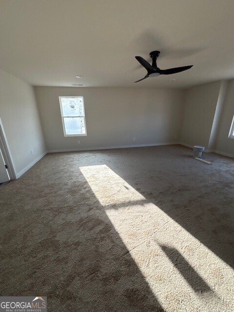 343 Jarrett Street, Unit 147 Fairburn, GA 30213 - Photo 11 of 22 a view of an empty room and window