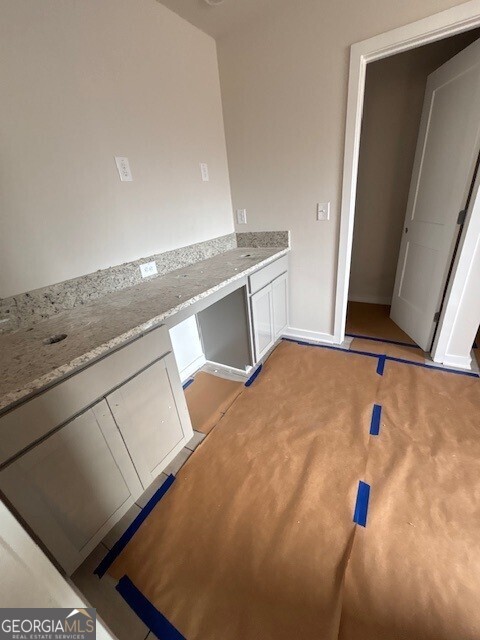 343 Jarrett Street, Unit 147 Fairburn, GA 30213 - Photo 19 of 22 a view of kitchen and microwave