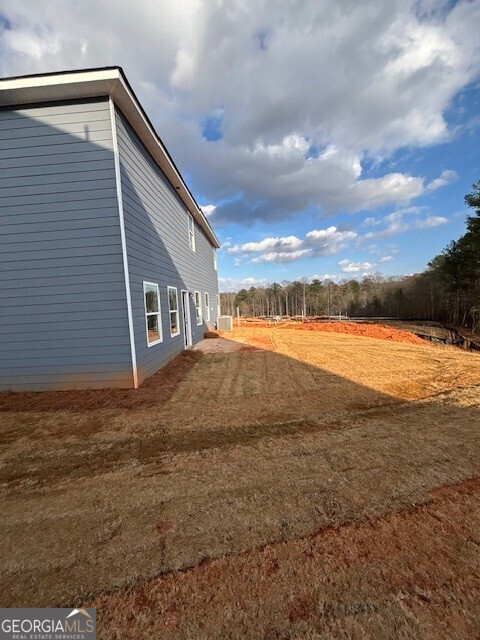 343 Jarrett Street, Unit 147 Fairburn, GA 30213 - Photo 20 of 22 a view of an ocean beach