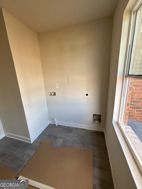 343 Jarrett Street, Unit 147 Fairburn, GA 30213 - Photo 9 of 22 an empty room with windows